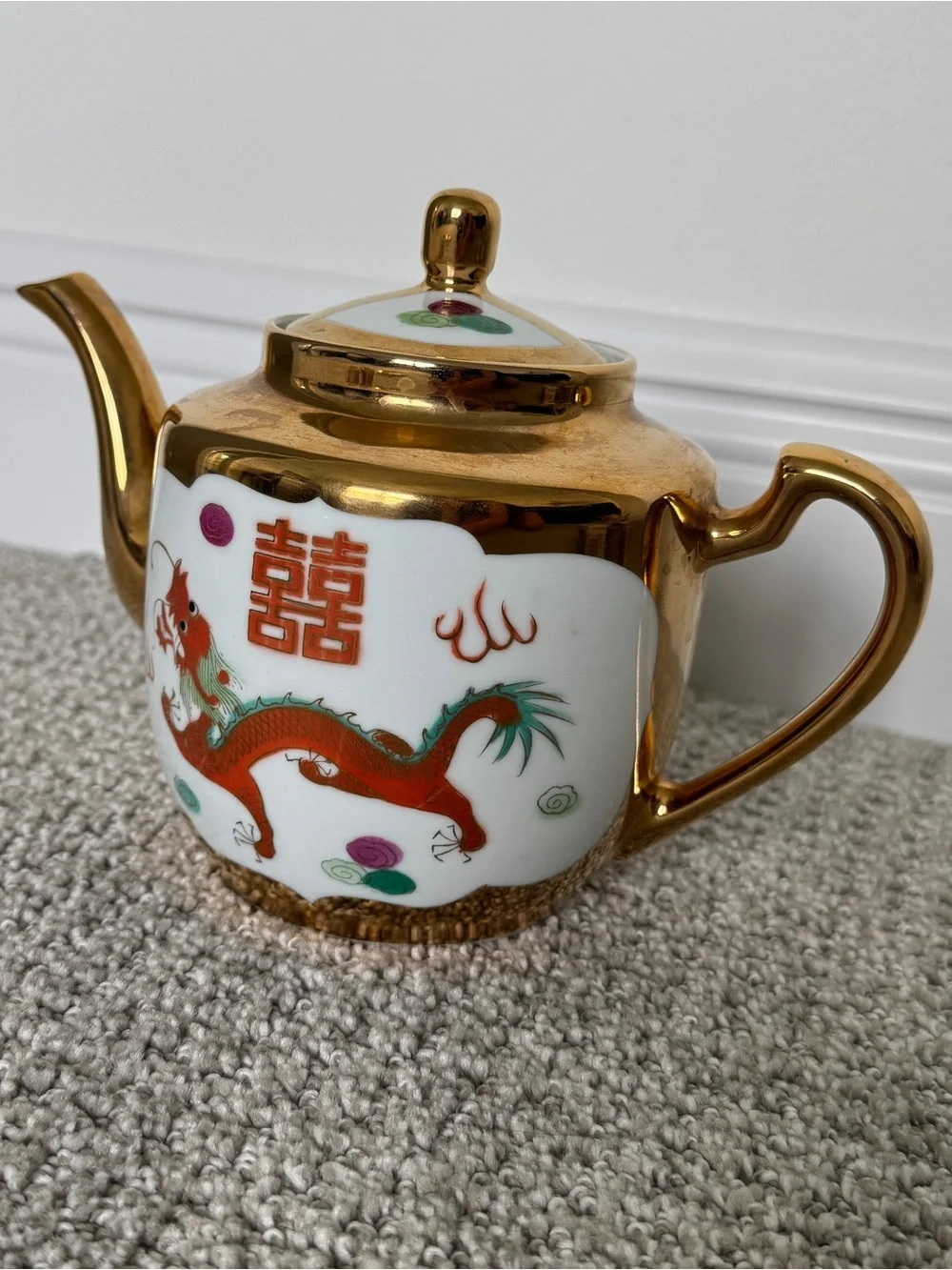 Porcelain tea set with Chinese deagon motifs